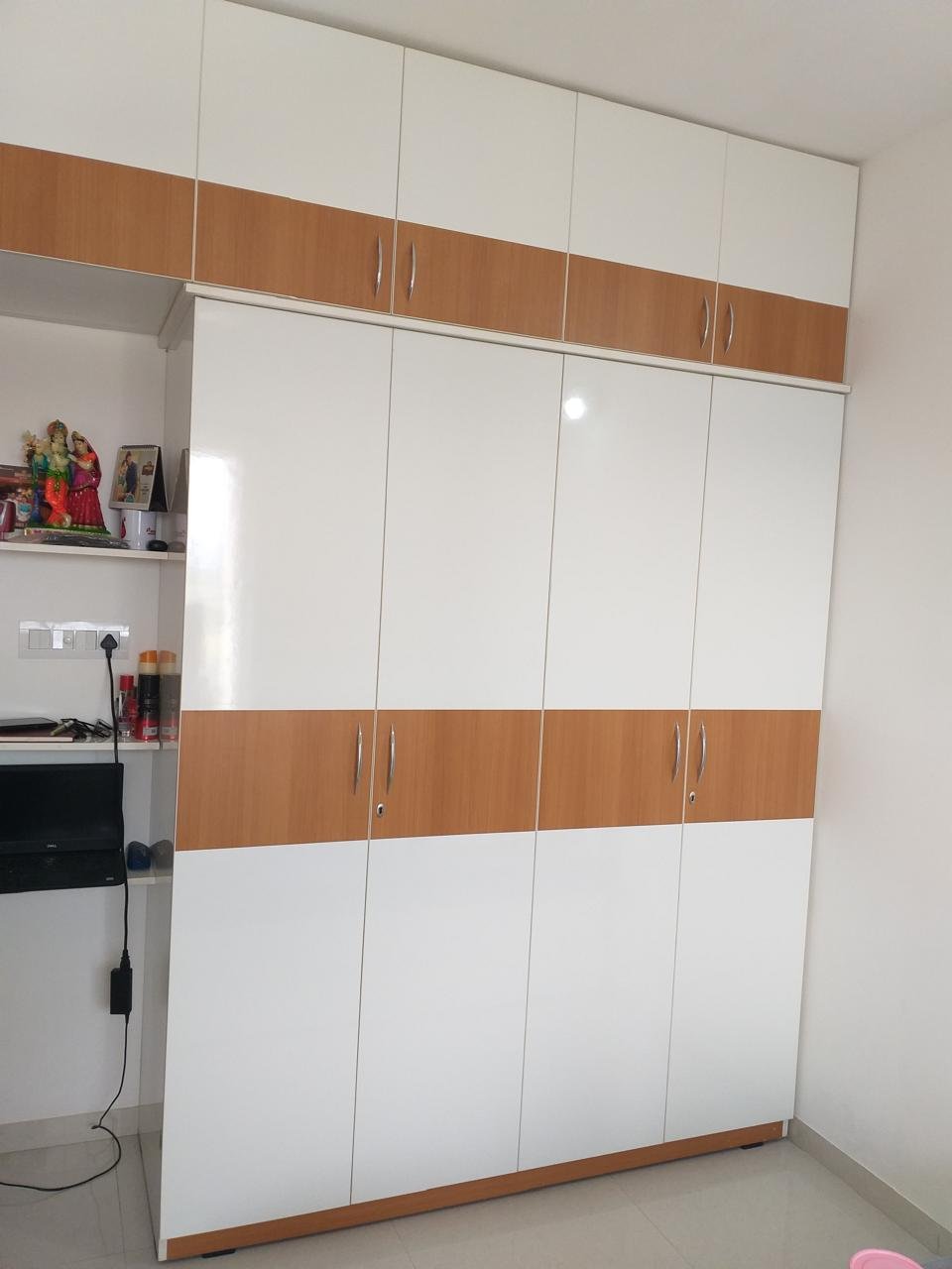 White and wood-grain wardrobe with matching loft cabinets