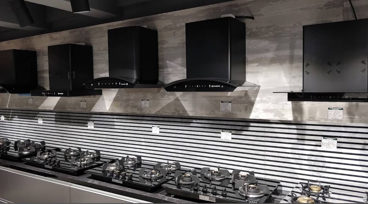 Kitchen chimneys and hobs on display at the Wood World showroom